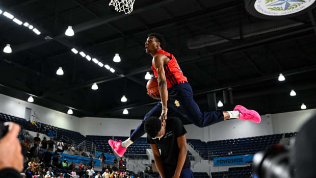 Bronny James jumps over his brother in a dunk contest.